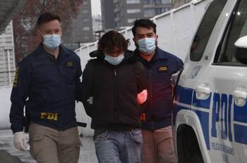 Cuerpo calcinado en Santiago Centro: Conflicto pasional sería detonante de crimen