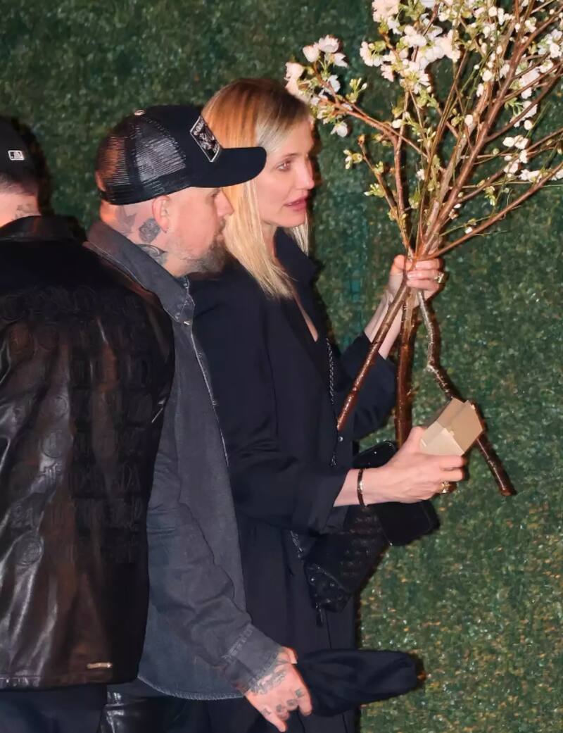 Cameron Díaz y Benji Madden entrando a la fiesta de cumpleaños de Rob Lowe