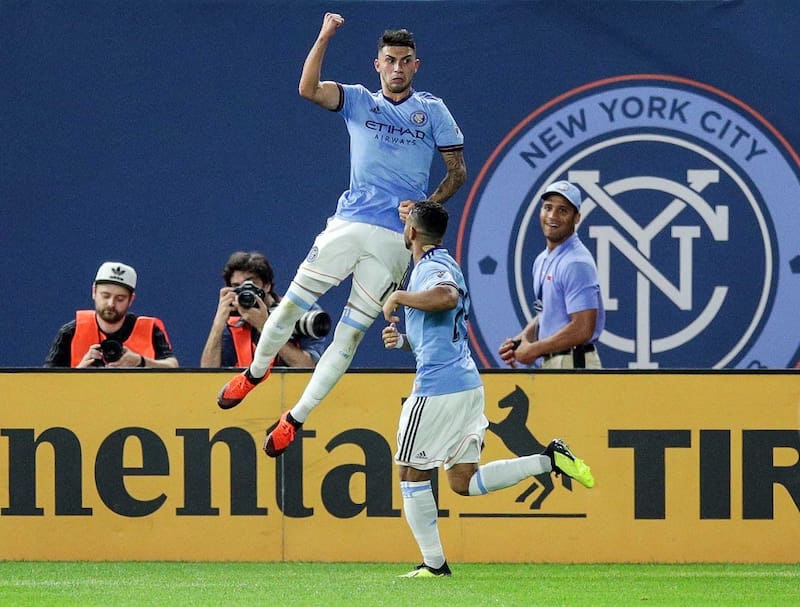 Aug 4, 2018; New York, NY, USA; New York City FC forward Valentin Castellanos (11) celebrates his goal with midfielder Ismael Tajouri (29) during the second half against the Vancouver Whitecaps at Yankee Stadium. Mandatory Credit: Vincent Carchietta-USA TODAY Sports