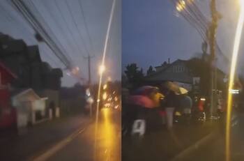 VIDEO | ¡Incluso con lluvia! Personas de Osorno realizan interminables filas para conseguir pellet