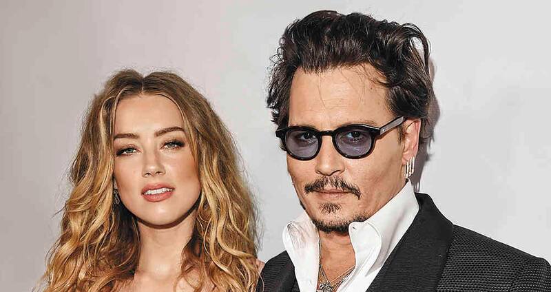 CULVER CITY, CA - JANUARY 09:  Actors Amber Heard (L) and Johnny Depp attend The Art of Elysium 2016 HEAVEN Gala presented by Vivienne Westwood