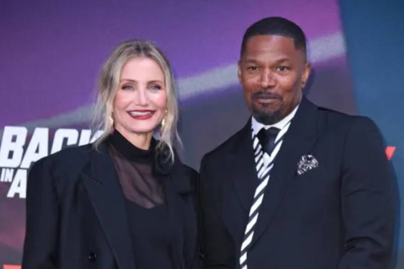 junto a Jamie Foxx en la alfombra roja de De Vuelta a la Acción.