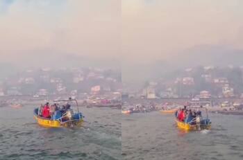 VIDEO | Personas atrapadas por incendios forestales en Arauco deben salir en botes y ser rescatados