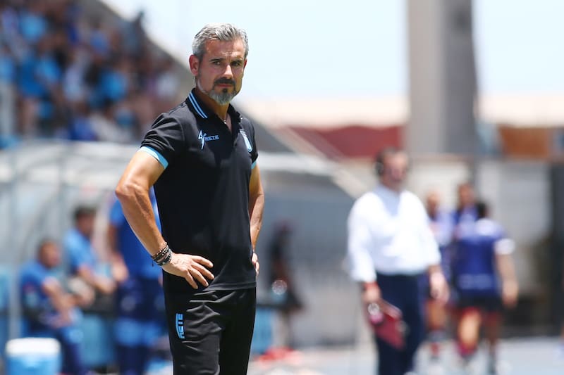 . Miguel Ramírez, su entrenador.