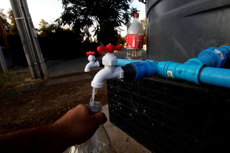 Revisa las medidas anunciadas por Aguas Andinas ante la suspensión del suministro Foto: ATON.