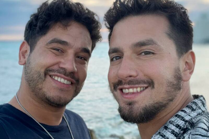 Gino Costa junto a su pareja, Miguel Ángel Campos.