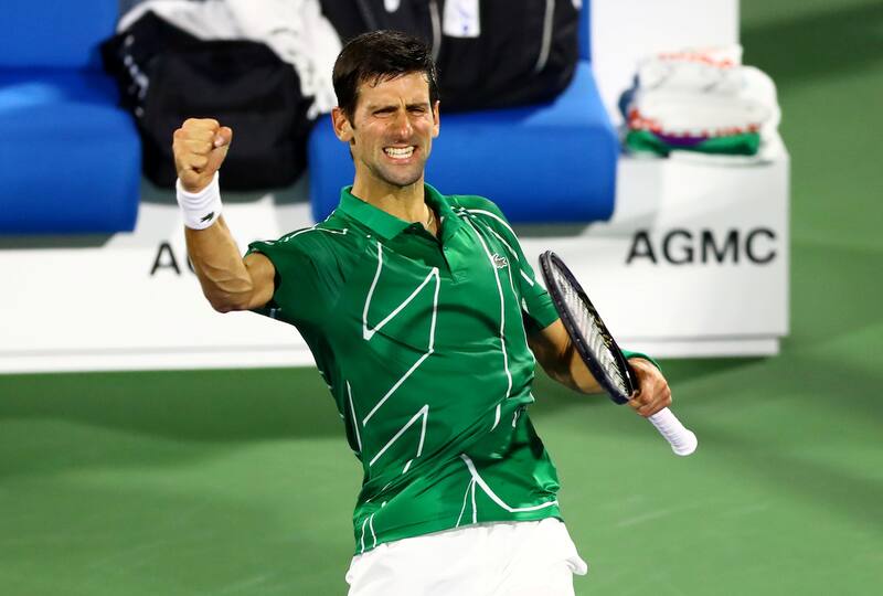 Imagen de archivo de la celebración del serbio Novak Djokovic tras ganar al griego Stefanos Tsitsipas la final del torneo ATP 500 de Dubái, EAU. 29 febrero 2020. REUTERS/Ahmed Jadallah