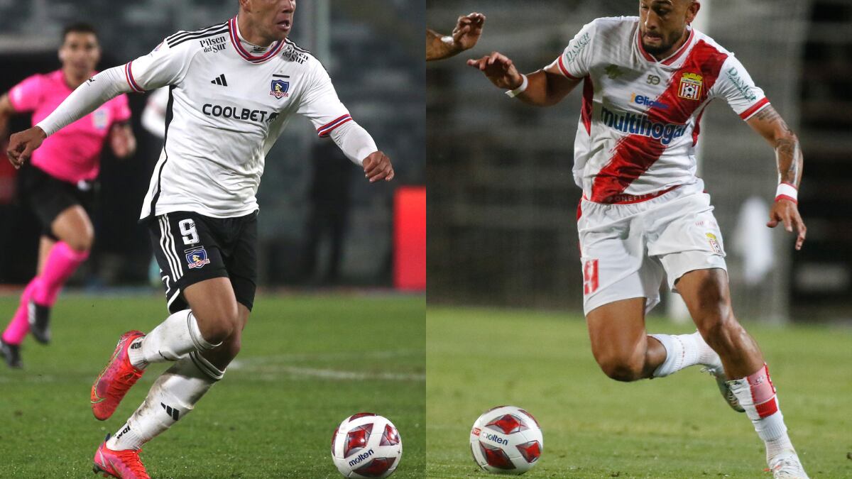 Los futbolistas Damián Pizarro de Colo Colo y Tobías Figueroa de Curicó Unido corriendo con el balón controlado.
