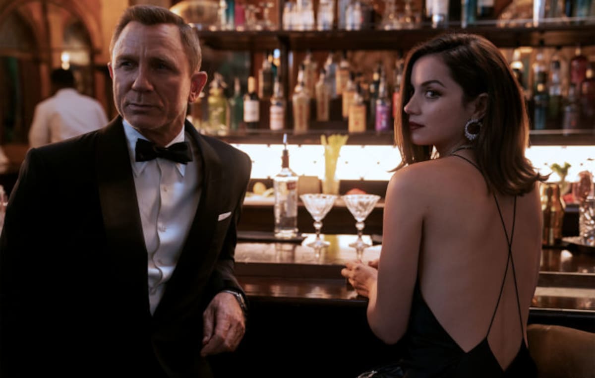 B25_39456_RC2
James Bond (Daniel Craig) and Paloma (Ana de Armas) in
NO TIME TO DIE
an EON Productions and Metro Goldwyn Mayer Studios film
Credit: Nicola Dove
© 2020 DANJAQ, LLC AND MGM. ALL RIGHTS RESERVED.