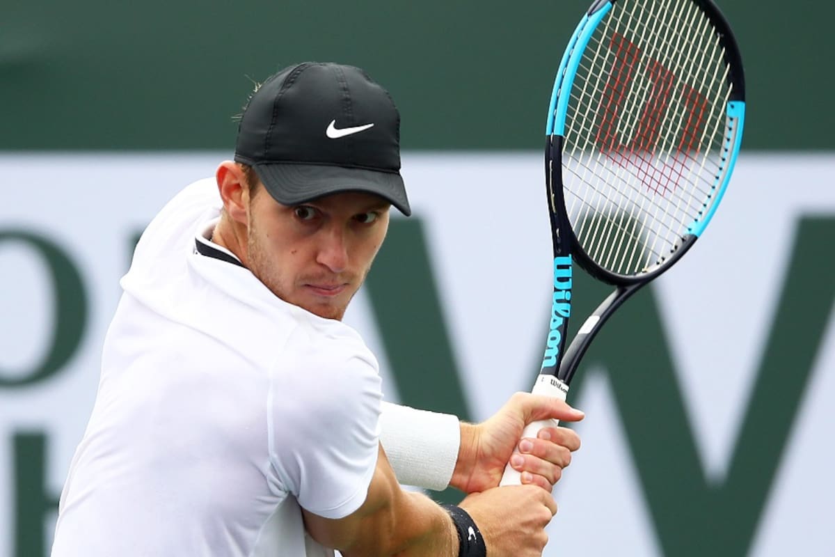 INDIAN WELLS, CALIFORNIA - MARCH 10: Nicolas Jarry of Chile plays a backhand during his men's singles second round match against Kyle Edmund of Great Britain on day seven of the BNP Paribas Open at the Indian Wells Tennis Garden on March 10, 2019 in Indian Wells, California. Clive Brunskill/Getty Images/AFP