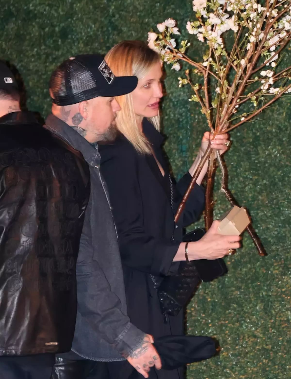 Cameron Díaz y Benji Madden entrando a la fiesta de cumpleaños de Rob Lowe