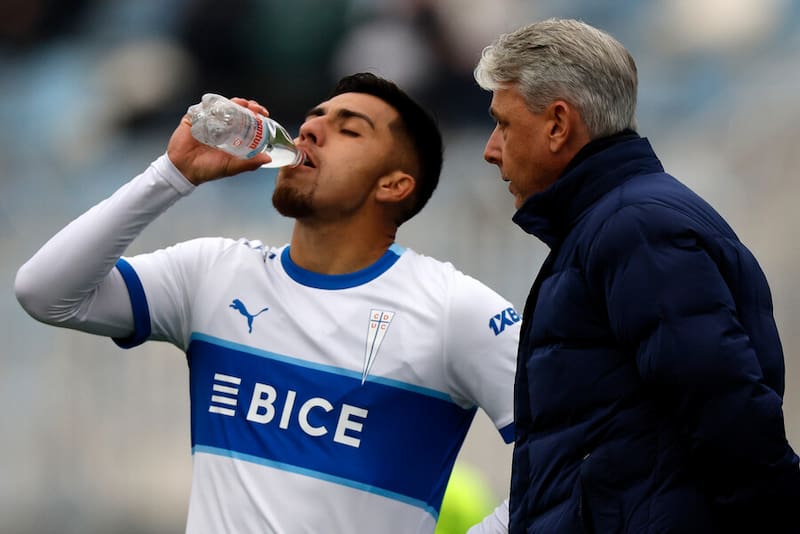 César Pinares con Tiago Nunes en la UC