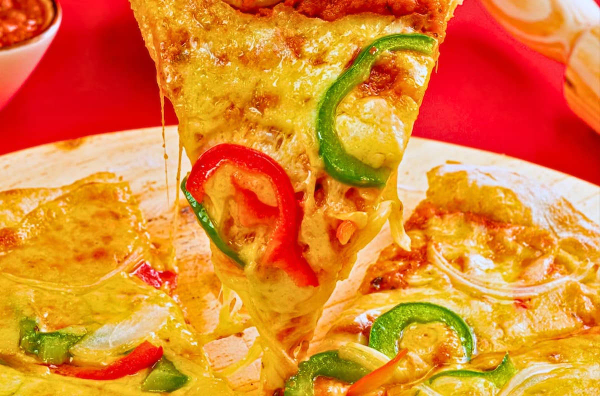 Pizzas con extra queso y pollo frito ultracrujiente: el rincón gastronómico que causa furor en San Miguel