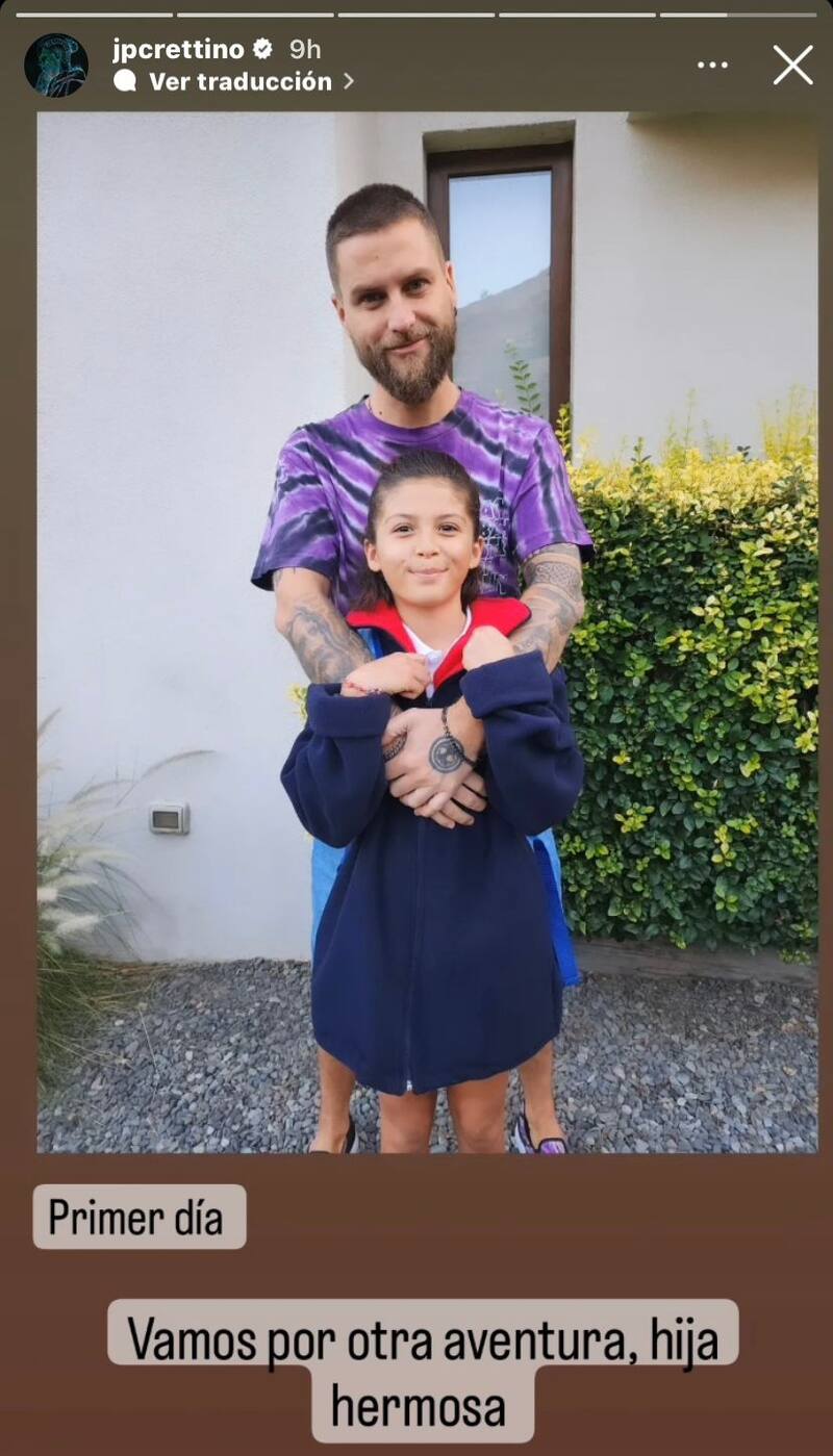 Jean Philippe Cretton y su hija el primer dia de clases