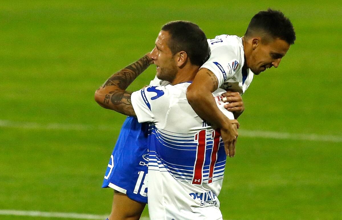 Luciano Aued y Diego Buonanotte compartiendo juntos en la UC. Foto: Agencia Aton.