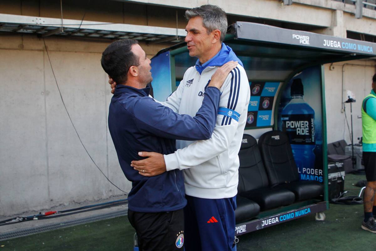 Manuel Fernández y Mauricio Pellegrino en el duelo de Audax Italiano y la U. Foto: Aton.