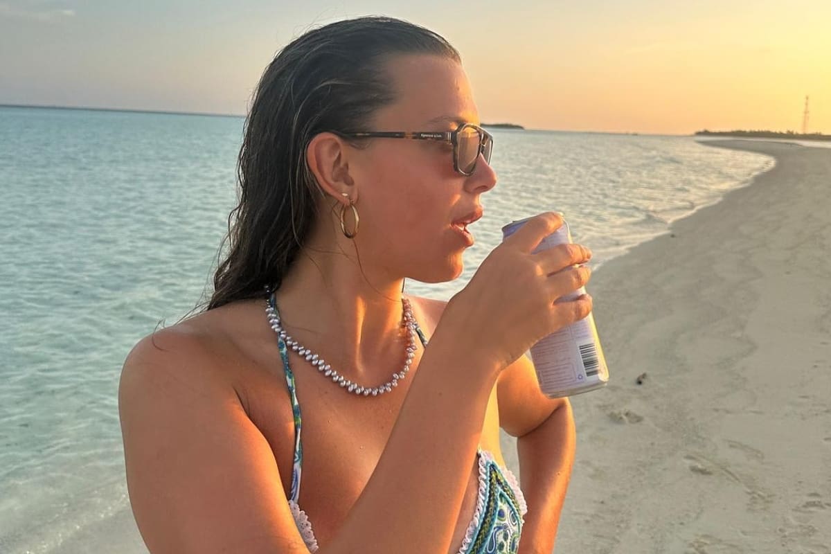 y sus fotos en la playa.