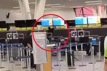 VIDEO | Pasajero haitiano fue detenido en Aeropuerto de Santiago: Rompió pantallas y computadores con un martillo