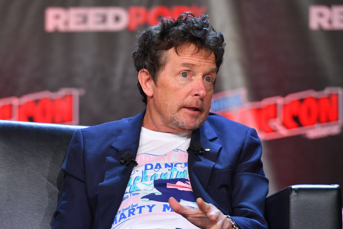 Actor Michael J. Fox attend the 'Back to the Future Reunion' at New York Comic Con on October 8, 2022 in New York.