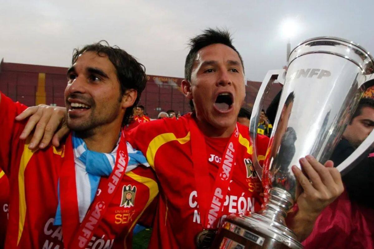 Sebastián Jaime y Gustavo Canales festejan el título de Primera División 2013 con Unión Española.