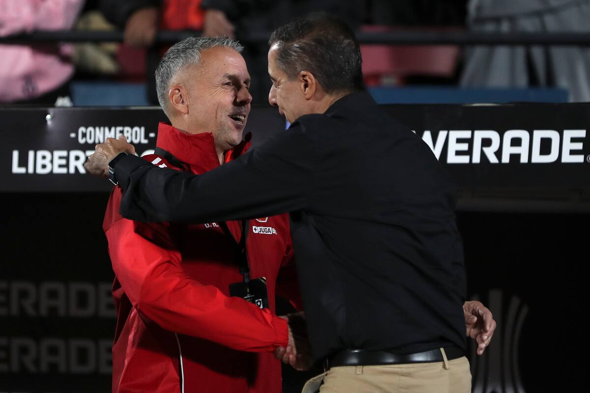 Gustavo Álvarez y Renato Paiva en el duelo de los azules ante Botafogo. Foto: Aton.