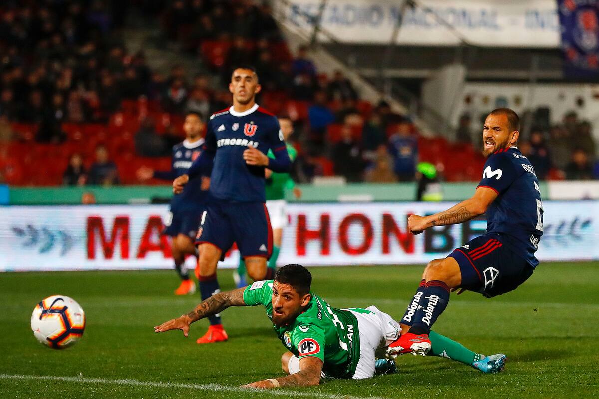 Futbol, Universidad de Chile vs Audax Italiano.
Segunda fecha, segunda vuelta Campeonato 2019.
El jugador de Audax Italiano Ignacio Jeraldino convierte un gol contra Universidad de Chile durante el partido de primera division realizado en el estadio Nacional de Santiago, Chile.
03/08/2019
Felipe Zanca/Photosport
Football, Universidad de Chile vs Audax Italiano.
Second date, second round Championship 2019
Audax Italiano's player Ignacio Jeraldino scores against Universidad de Chile during the first division football match held at the Nacional stadium in Santiago, Chile.
03/08/2019
Felipe Zanca/Photosport