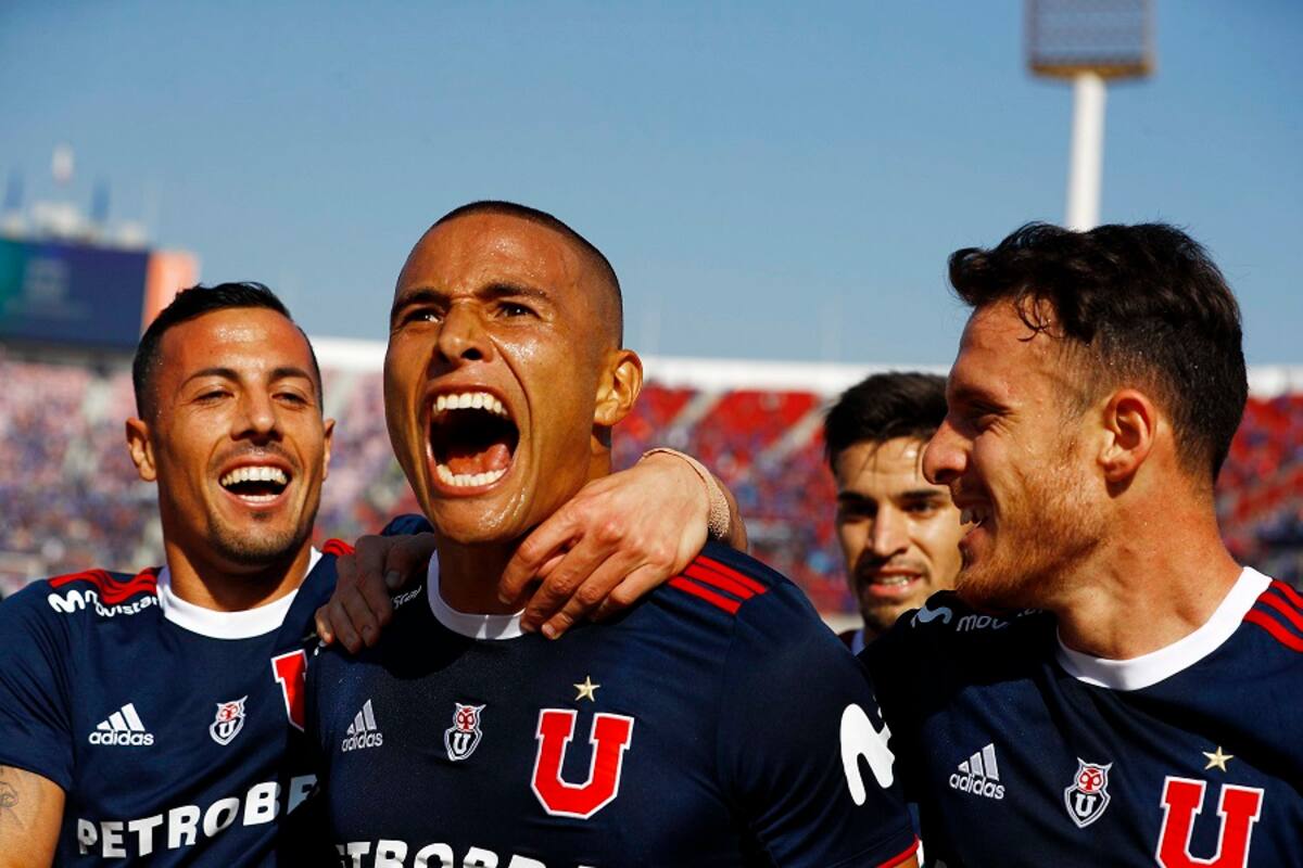 Futbol, Universidad de Chile vs Colo Colo
Fecha 13, campeonato nacional 2019
El jugador de Universidad de Chile Leandro Benegas, derecha, celebra su gol contra Colo Colo durante el partido de primera division disputado en el estadio Nacional de Santiago, Chile.
18/05/2019
Felipe Zanca/Photosport
Football, Universidad de Chile vs Colo Colo
13th date, National Championship 2019
Universidad de Chile's player Leandro Benegas, right, celebrates after scoring against Colo Colo during the first division match held at the National stadium in Santiago, Chile.
18/05/2019
Felipe Zanca/Photosport