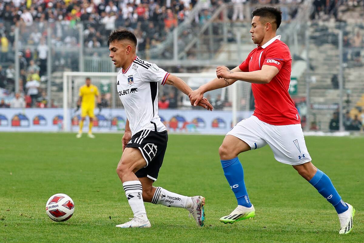Vicente Pizarro y Alexander Aravena, jugadores de Colo Colo y Universidad Católica. Agencia Aton